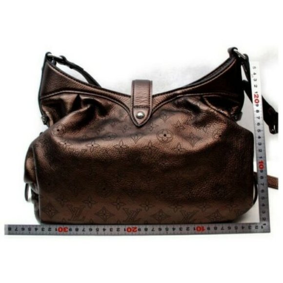 LOUIS VUITTON XS MORDRE MONOGRAM MAHINA - Picture 15 of 15